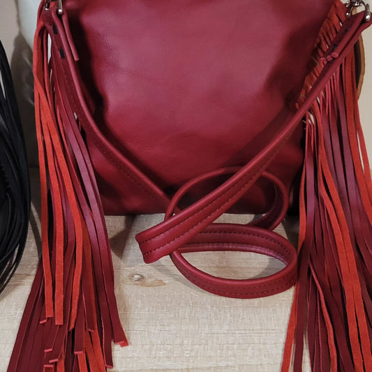 Black and white HOH with red leather fringe - j.huber leather designs
