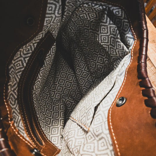 Turquoise studded Hair on Hide fringe bag