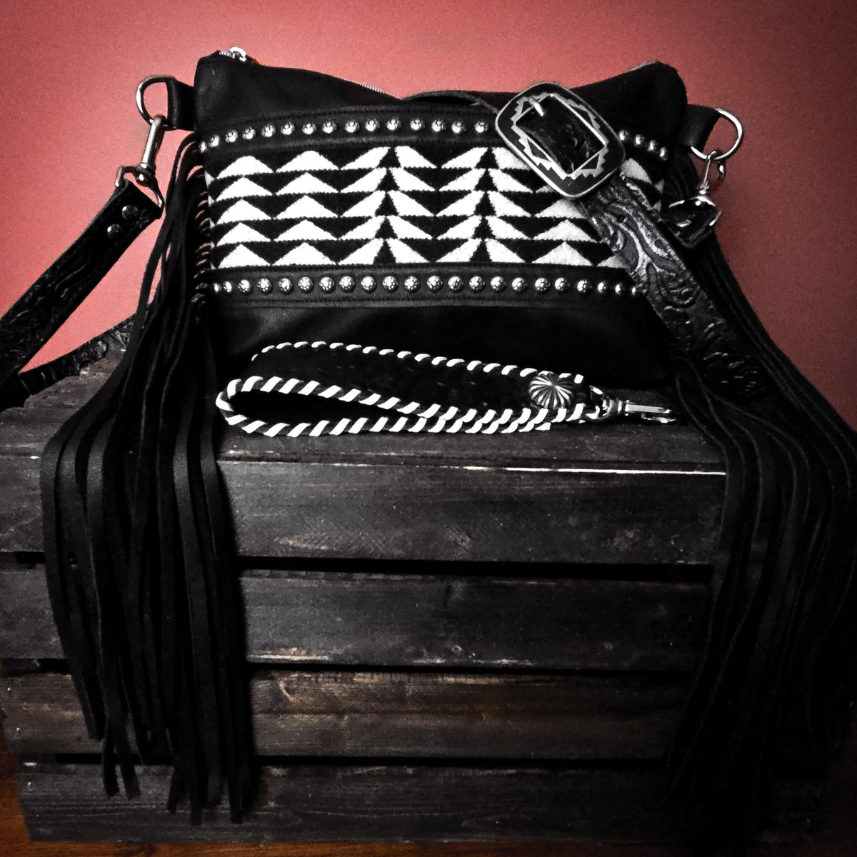 Handcrafted full-grain leather Pendleton wool fringe bag with silver-tone studwork