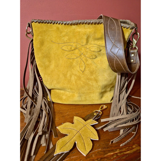 Goldenrod suede western shoulder bag with leather fringe and stitched leaf design