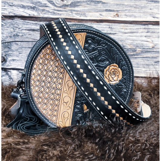 Midnight Rose hand-tooled western leather round bag with rose scroll tooling and black suede back front view