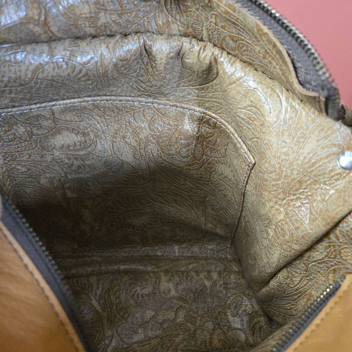 Outrider bag fully lined with coordinating embossed leather