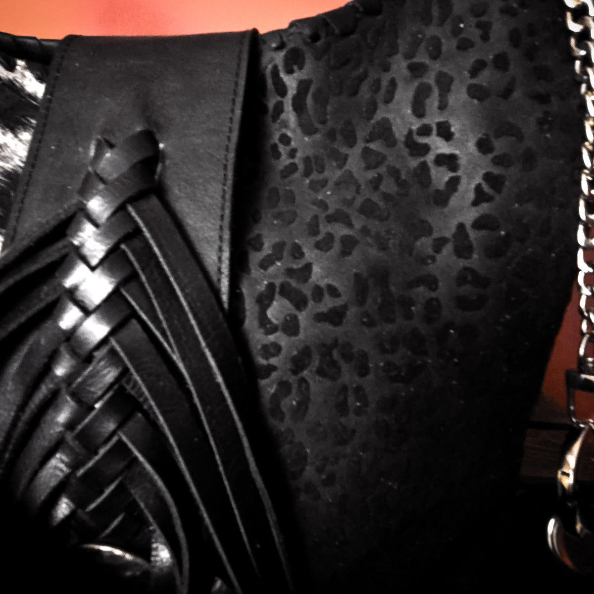 Handcrafted western shoulder bag with hair-on hide and black leopard-print suede