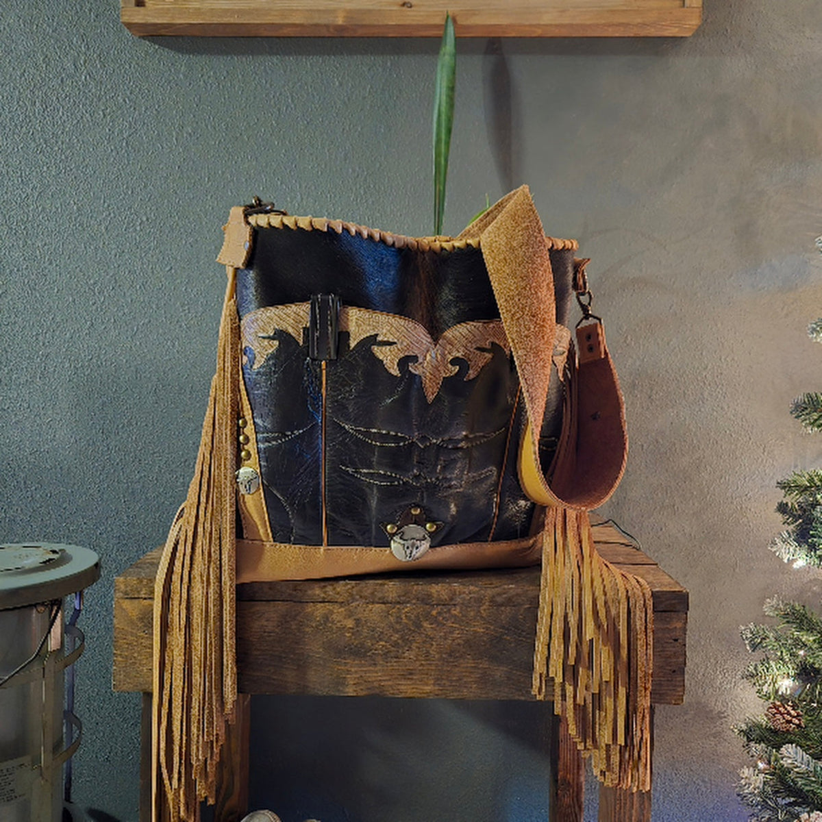 Vintage boot leather and black hair-on-hide western shoulder bag