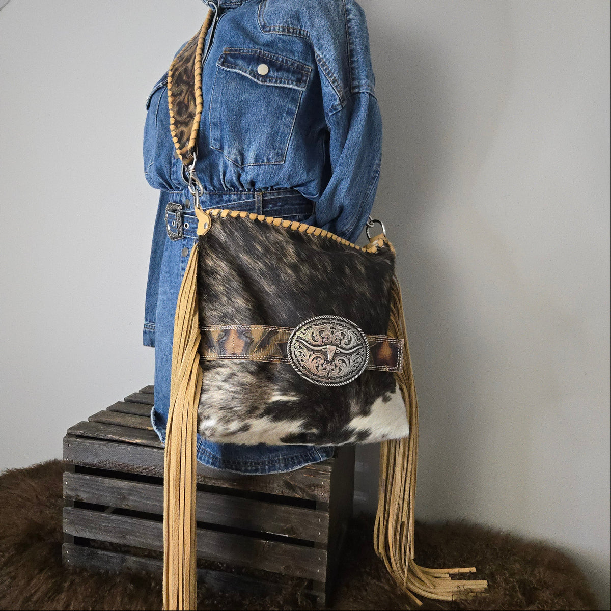 Western shoulder bag shown with an example trophy buckle not included