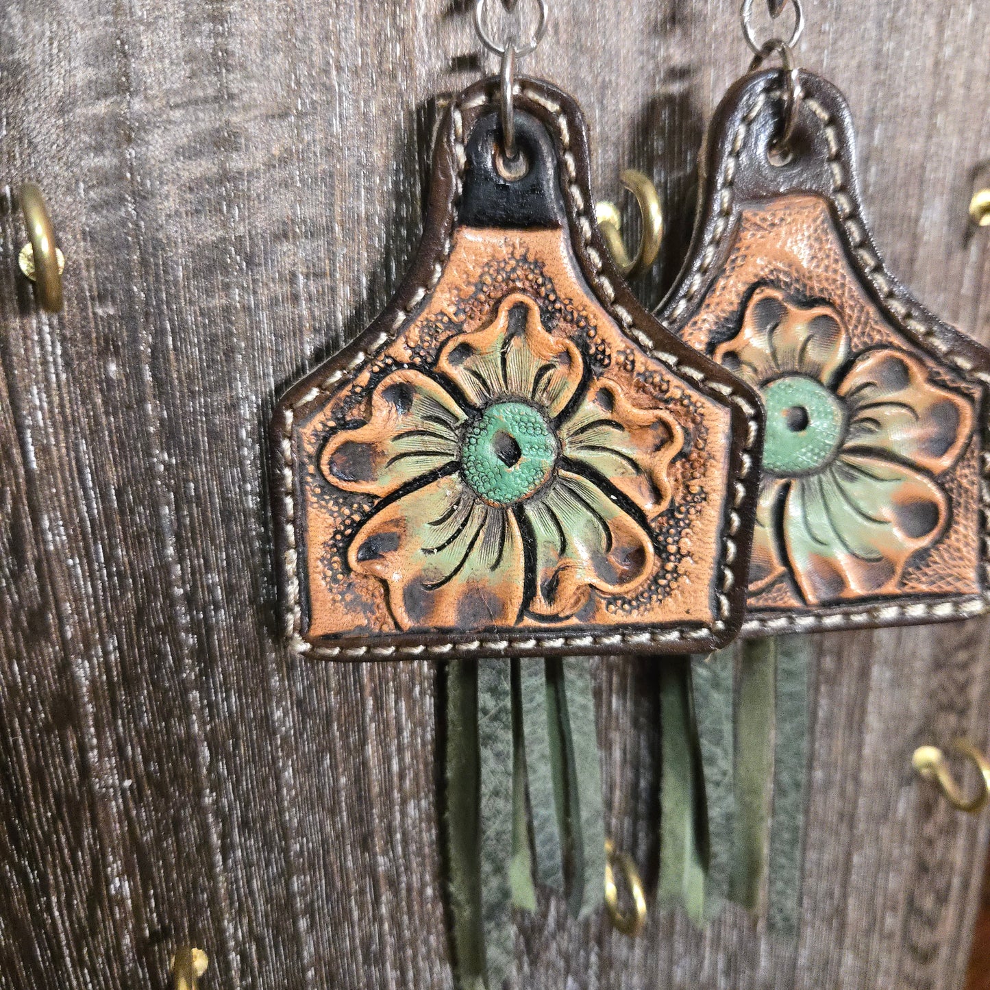 Green flower Cowtag Earrings with fringe